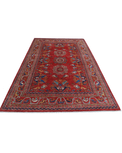 Humna 5' 10" X 9' 1" Hand Knotted Wool Rug 5' 10" X 9' 1" (178 X 277) / Red / Wool