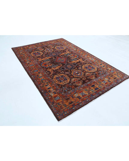 Humna 6' 0" X 8' 10" Hand Knotted Wool Rug 6' 0" X 8' 10" (183 X 269) / Brown / Wool