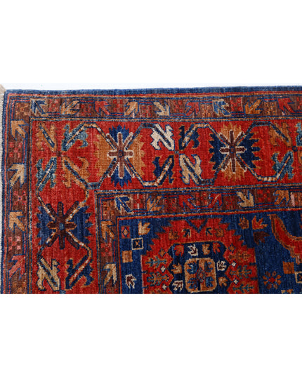 Humna 4' 11" X 6' 9" Hand Knotted Wool Rug 4' 11" X 6' 9" (150 X 206) / Blue / Wool