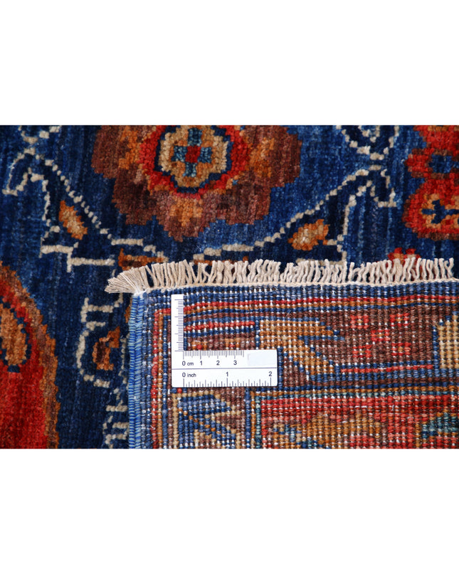 Humna 4' 11" X 6' 9" Hand Knotted Wool Rug 4' 11" X 6' 9" (150 X 206) / Blue / Wool