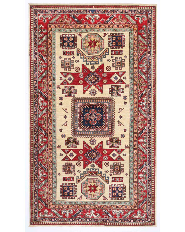 Kazak 5' 4" X 8' 1" Hand Knotted Wool Rug 5' 4" X 8' 1" (162 X 246) / Ivory / Wool